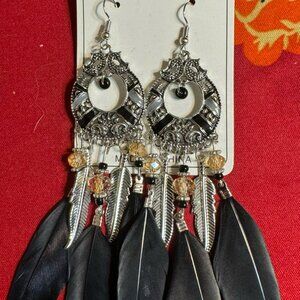 brand new never worn feather earrings silver